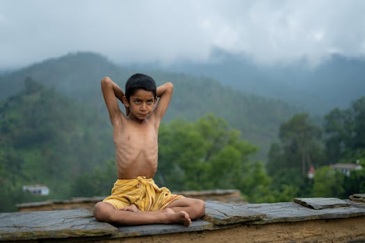 Image of a person practicing yoga in a peaceful setting