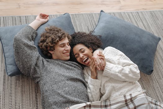 a man resting with a blanket and soup