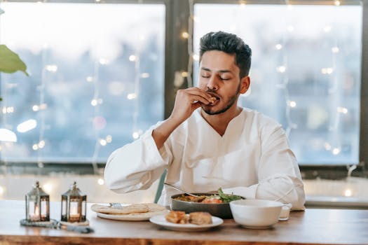 man enjoying a healthy meal while fasting